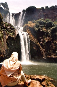 Cascades-D'Ouzoud-Waterfalls-Woman-Sitting-Outiside
