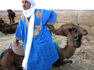 Tuareg-Man-In-Sahara-With-Camel