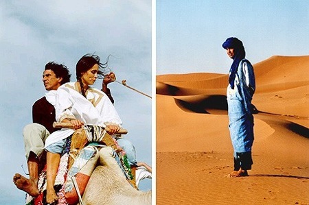 Merzouga-Sahara-Desert-Couple-On- Camel-Tuareg-Man